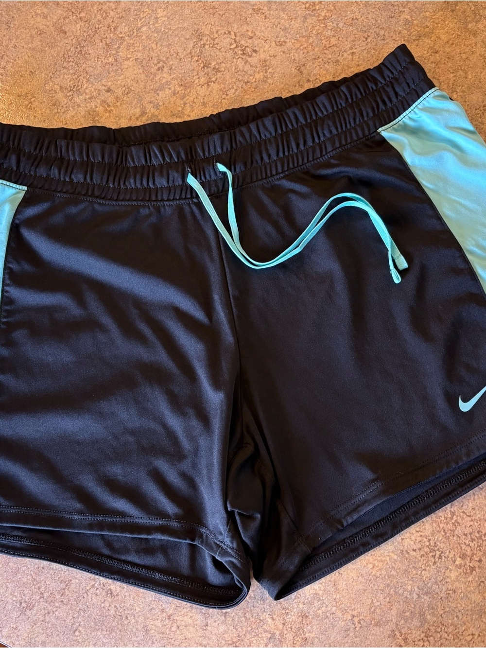 Nike Women's Black Athletic Shorts with Aqua Accents